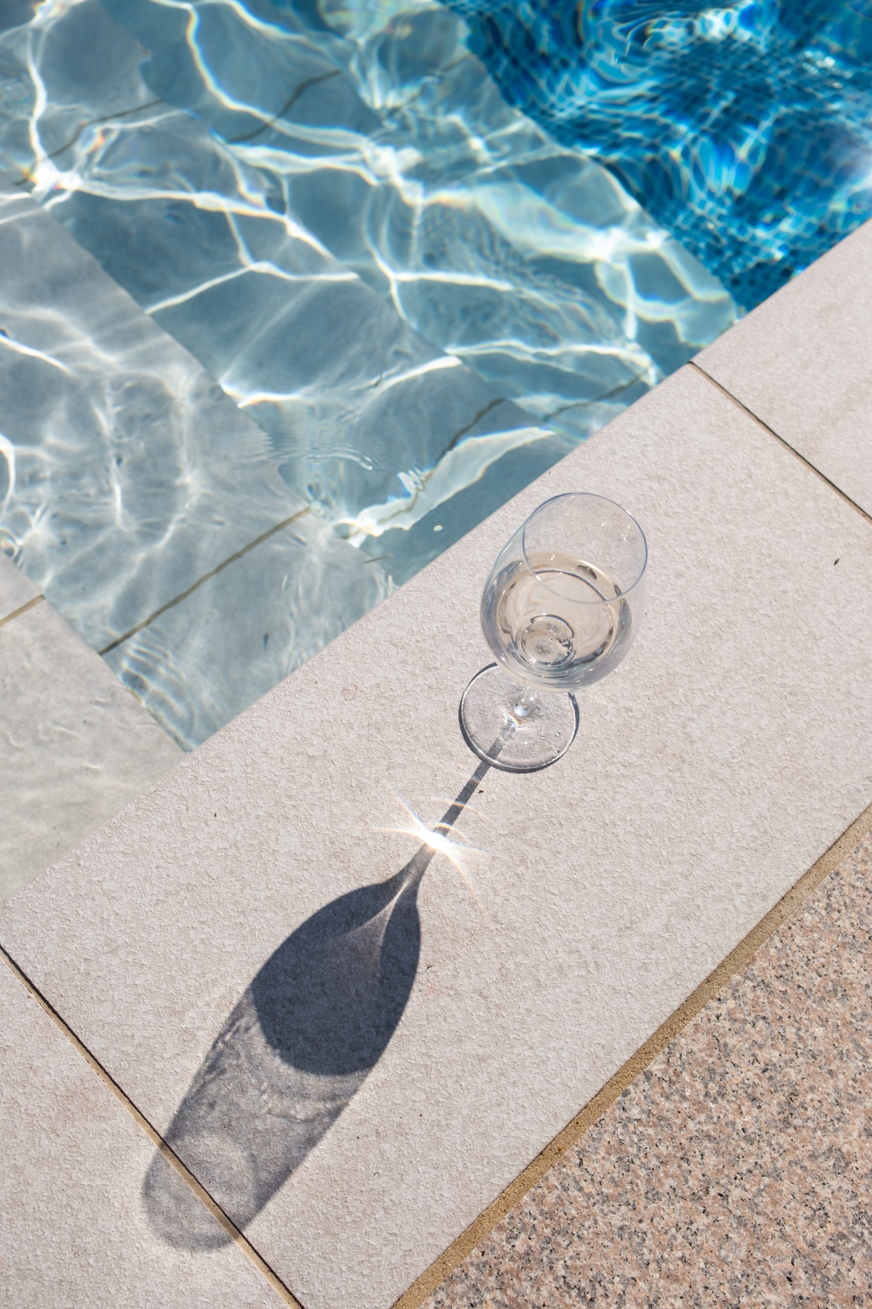 glass by a pool